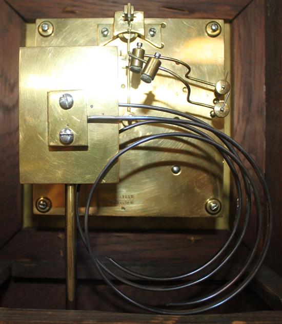 A late Victorian golden oak bracket clock, 13in.